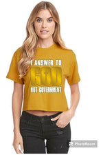 Load image into Gallery viewer, I Answer to God Not Government Ladies Crop Tee (color options)
